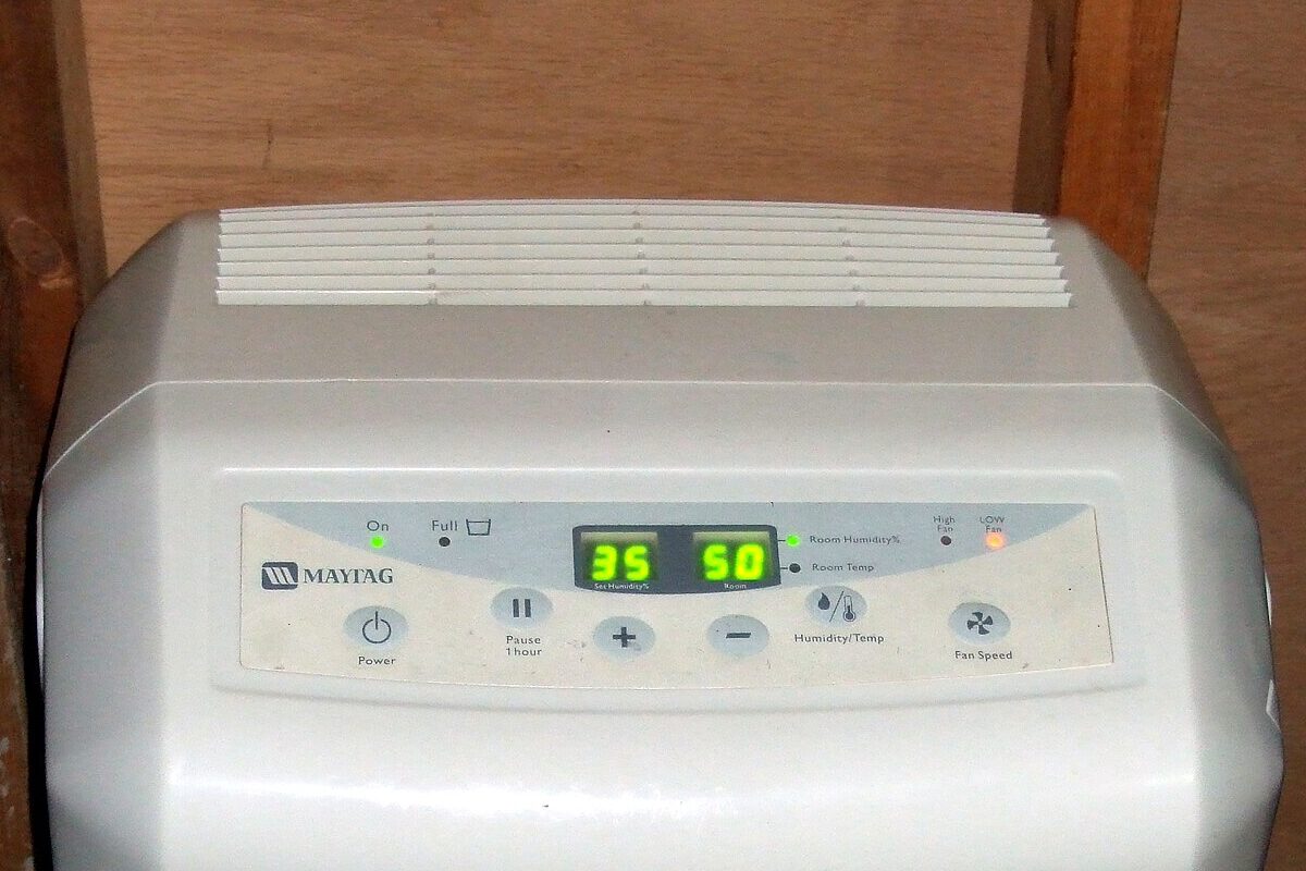 Controls and air grille on an illustrative portable Maytag residential dehumidifier